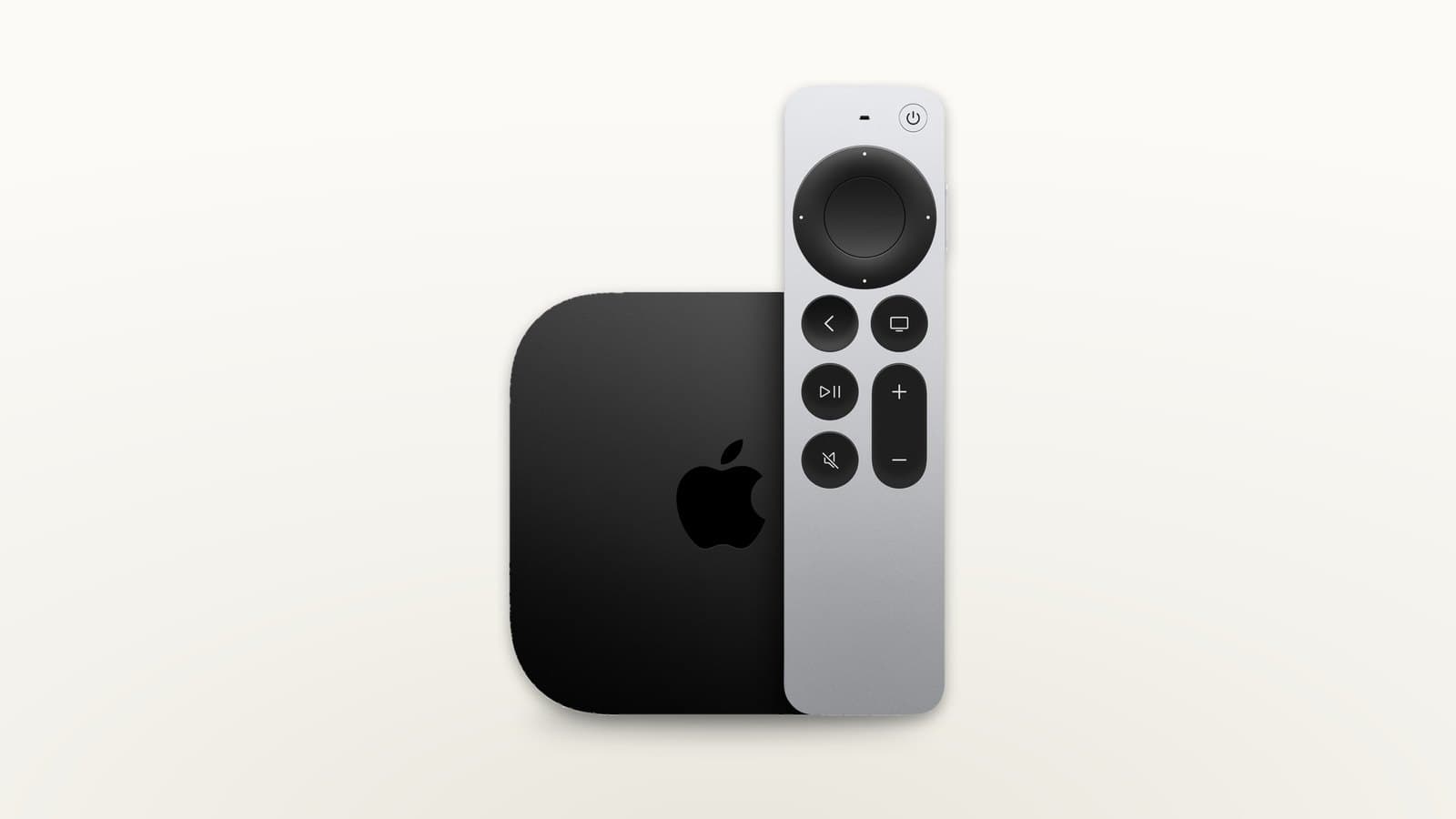 Aluminium Siri Remote next to an Apple TV 4K on a light background
