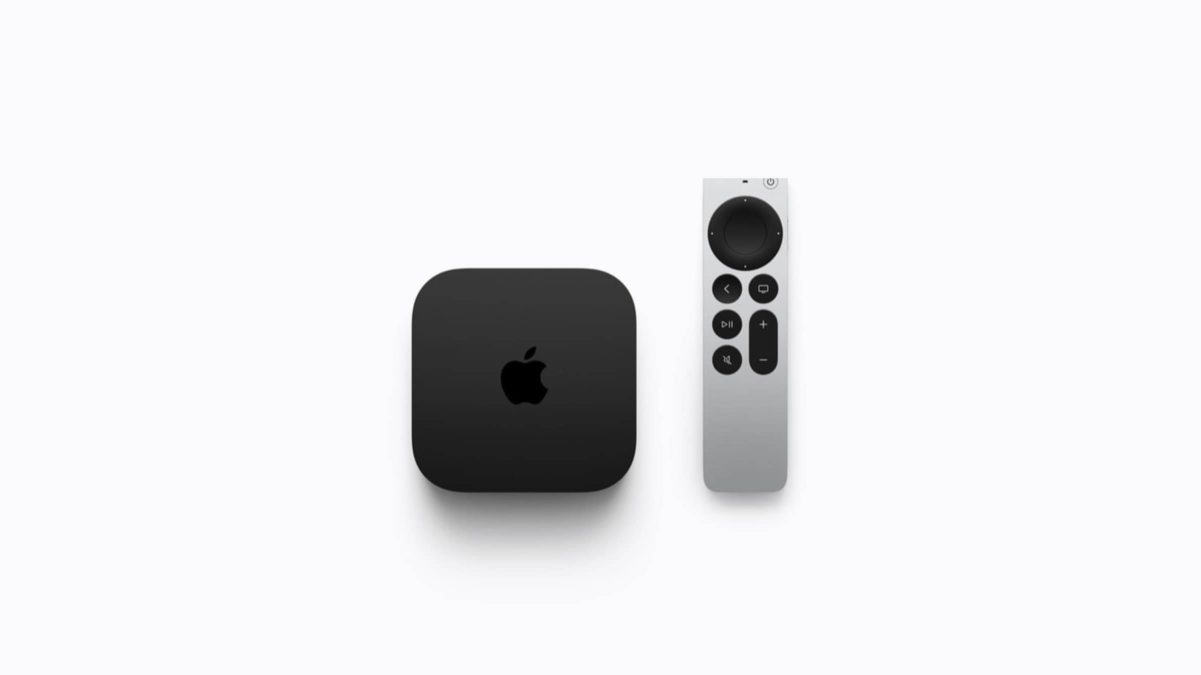 The new black Apple TV 4K box next to the silver Siri Remote on a white background