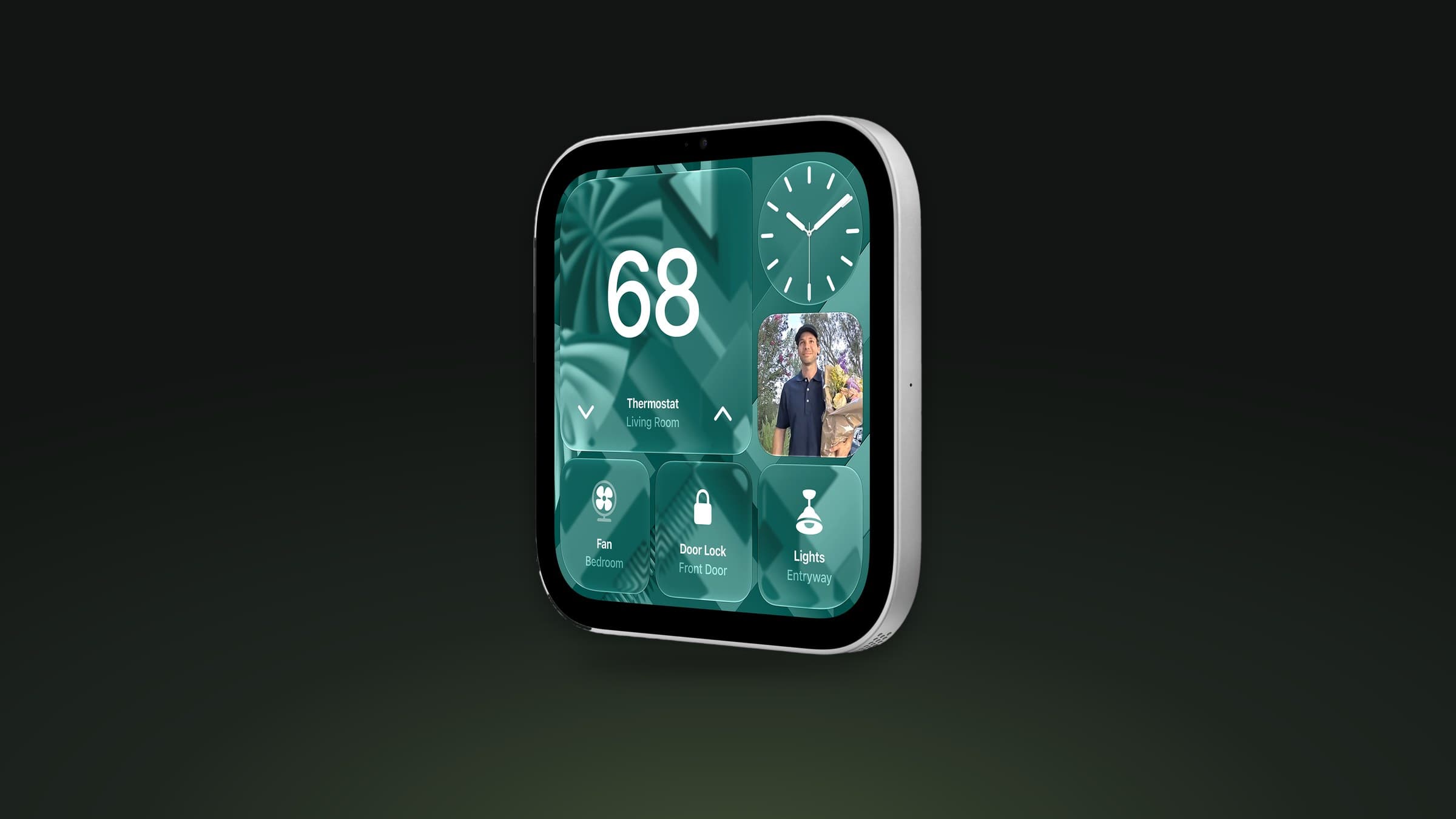 Apple's wall-mounted HomeView smart home display in silver, showing thermostat, lock and light controls, on a dark green background