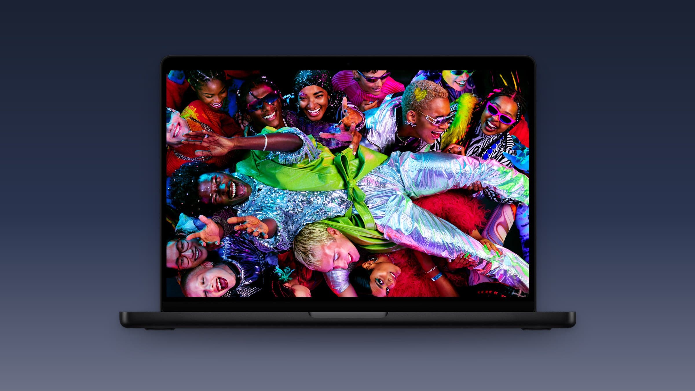 MacBook Pro with Liquid Retina XDR display on a blue gradient background
